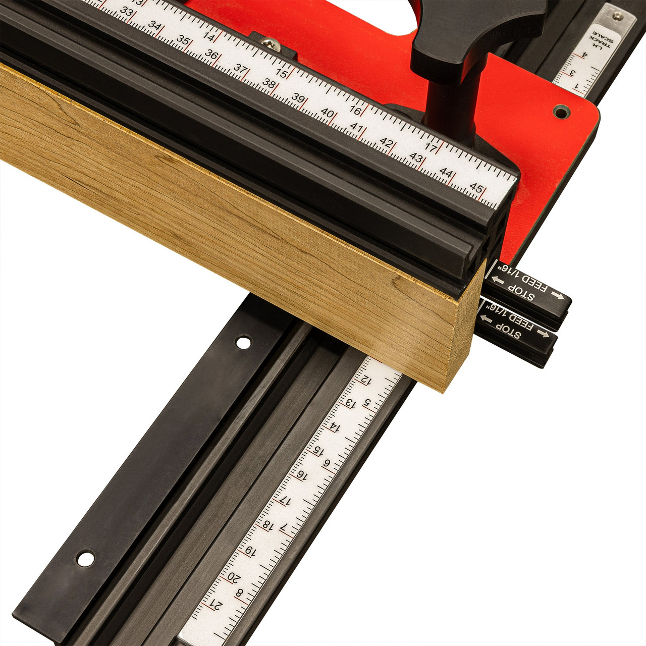 Close-up of fence base and scale with red phenolic track, white background